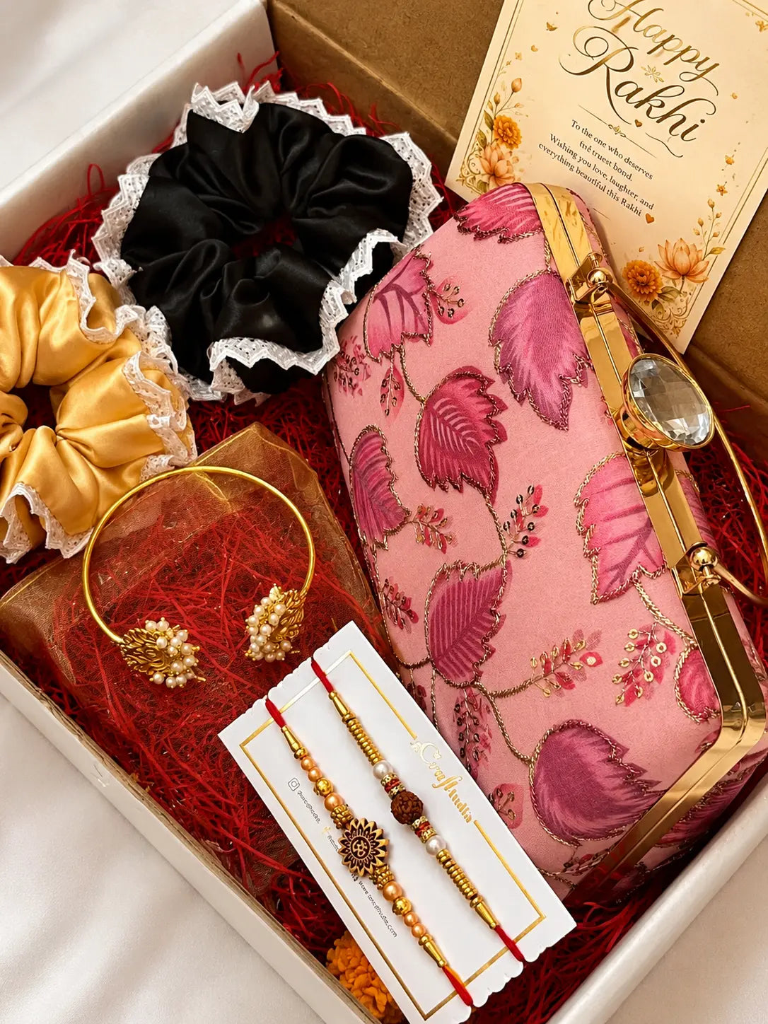 Rakhi Hamper - Aura Box Clutch - Pink & Twin Lotus Pearl Bangle YuvaStree