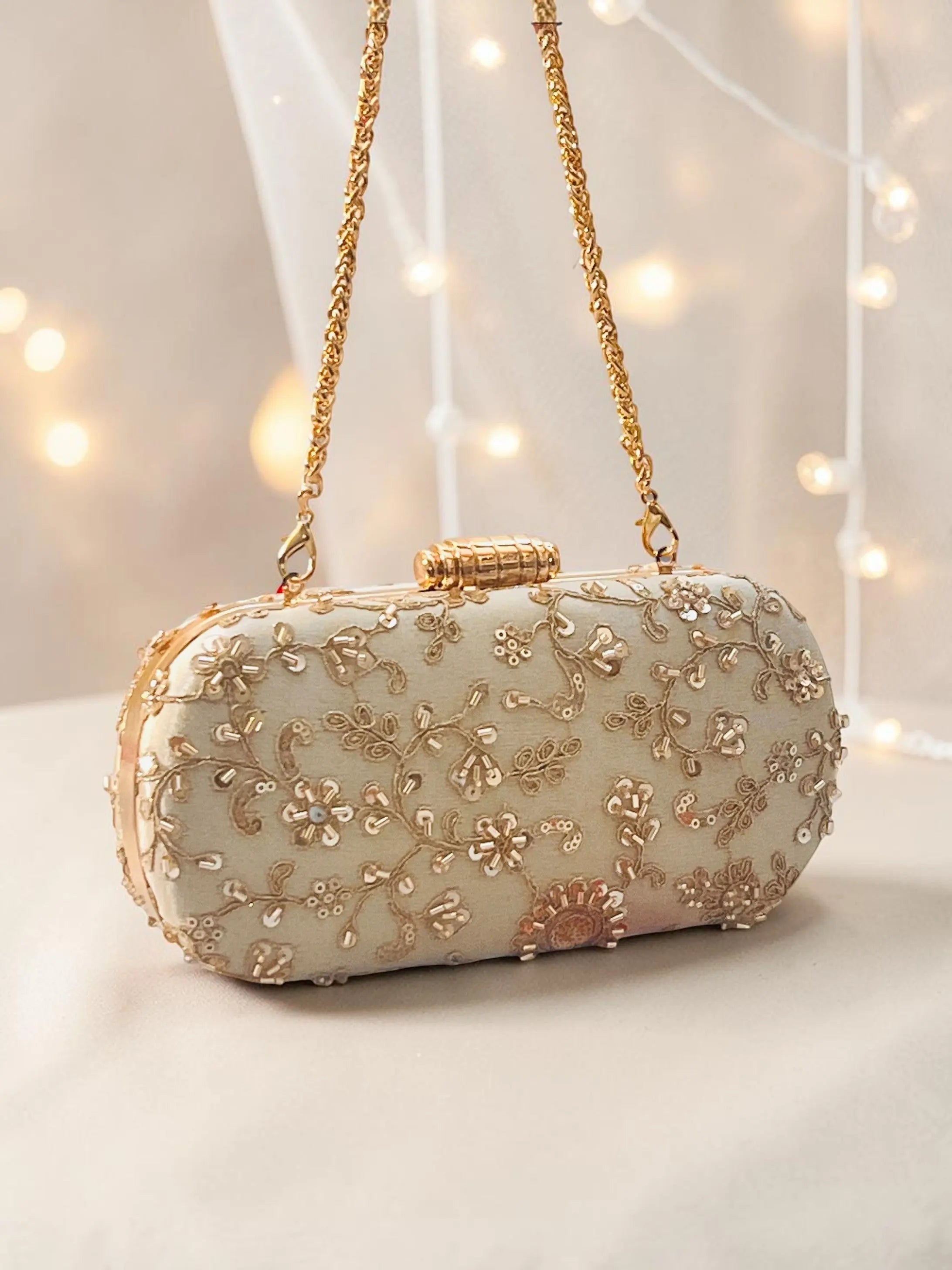 Noore Capsule Clutch - Gold YuvaStree