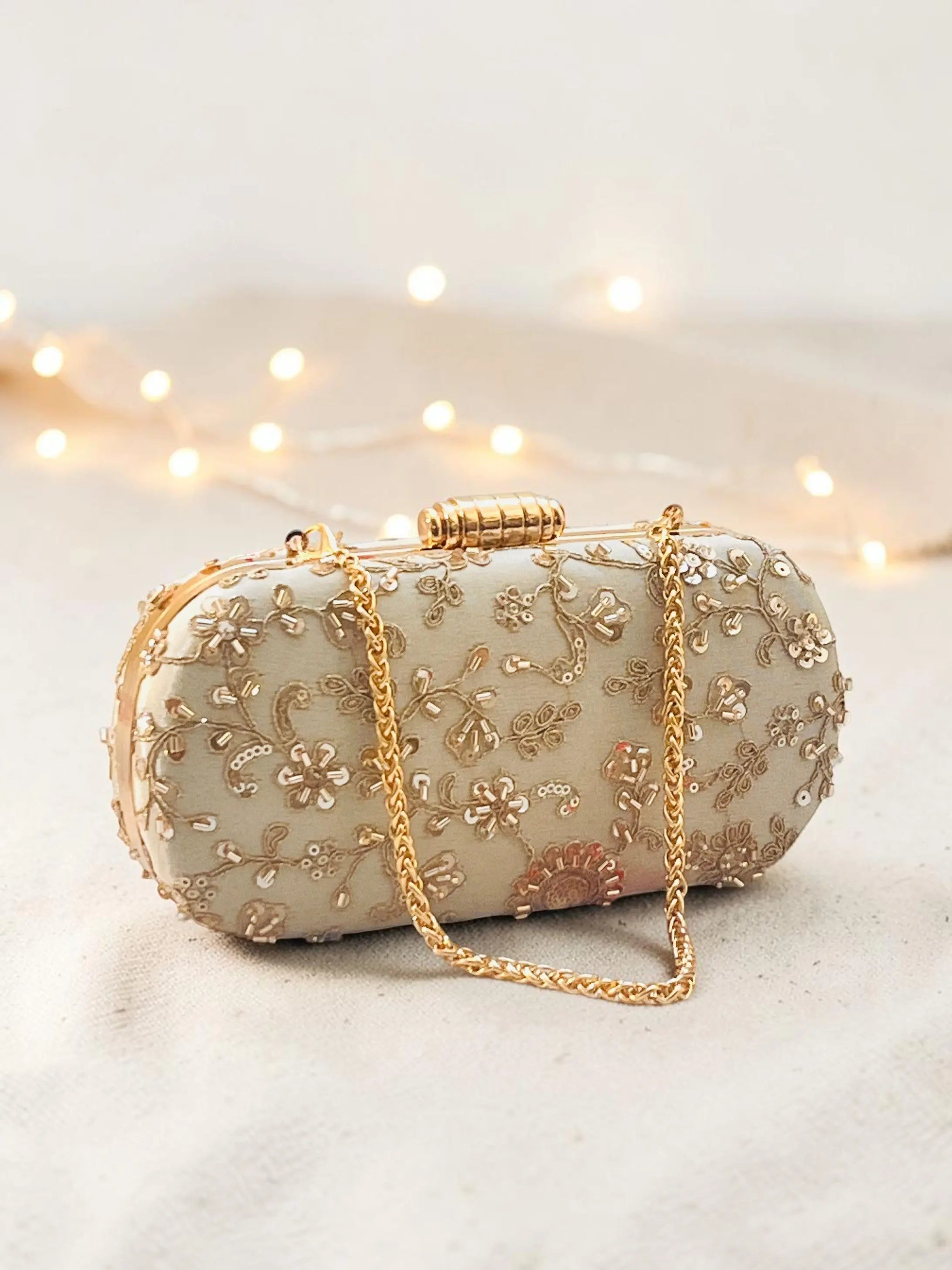 Noore Capsule Clutch - Gold YuvaStree