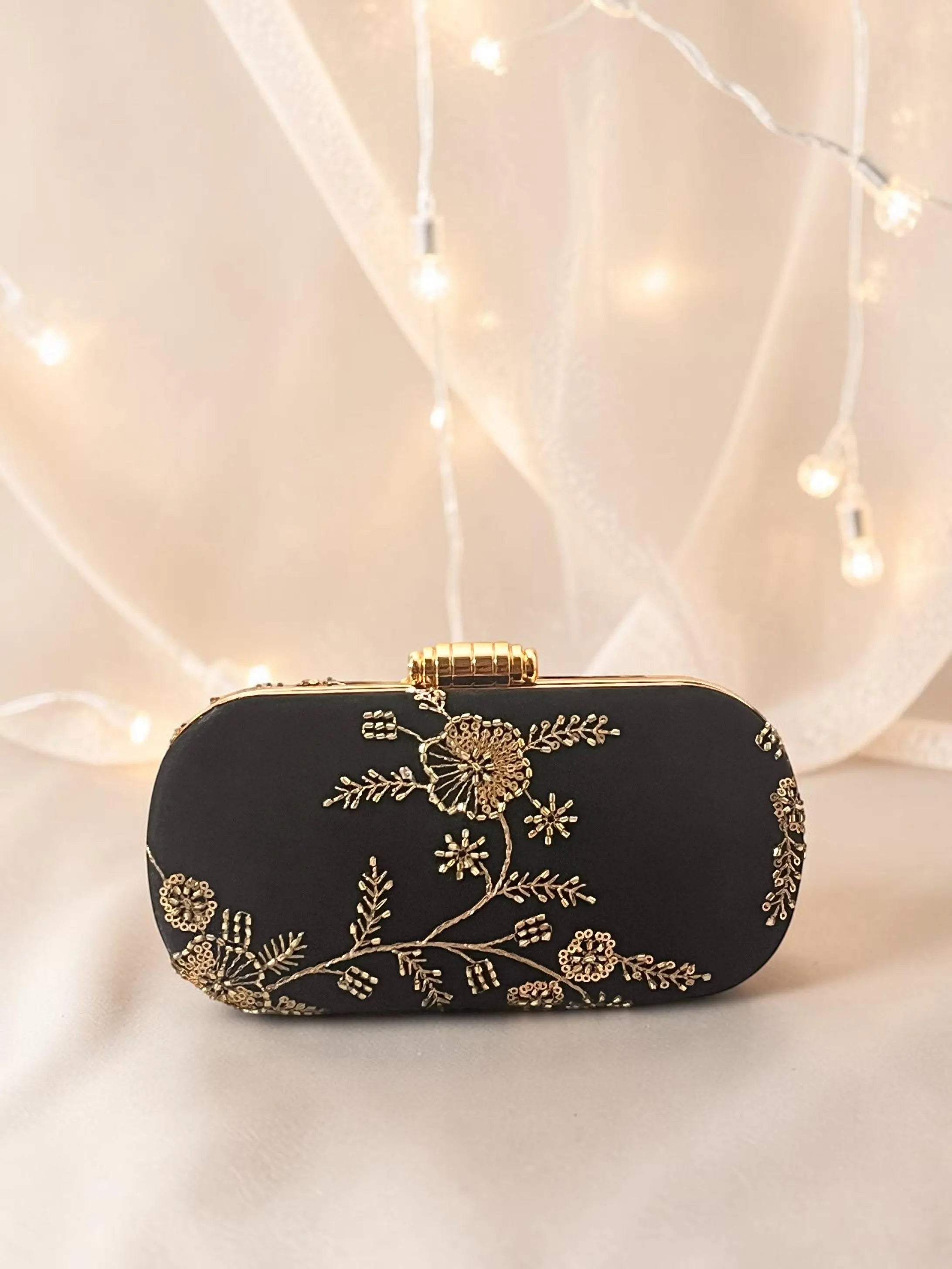 Noore Capsule Clutch - Black Gold YuvaStree