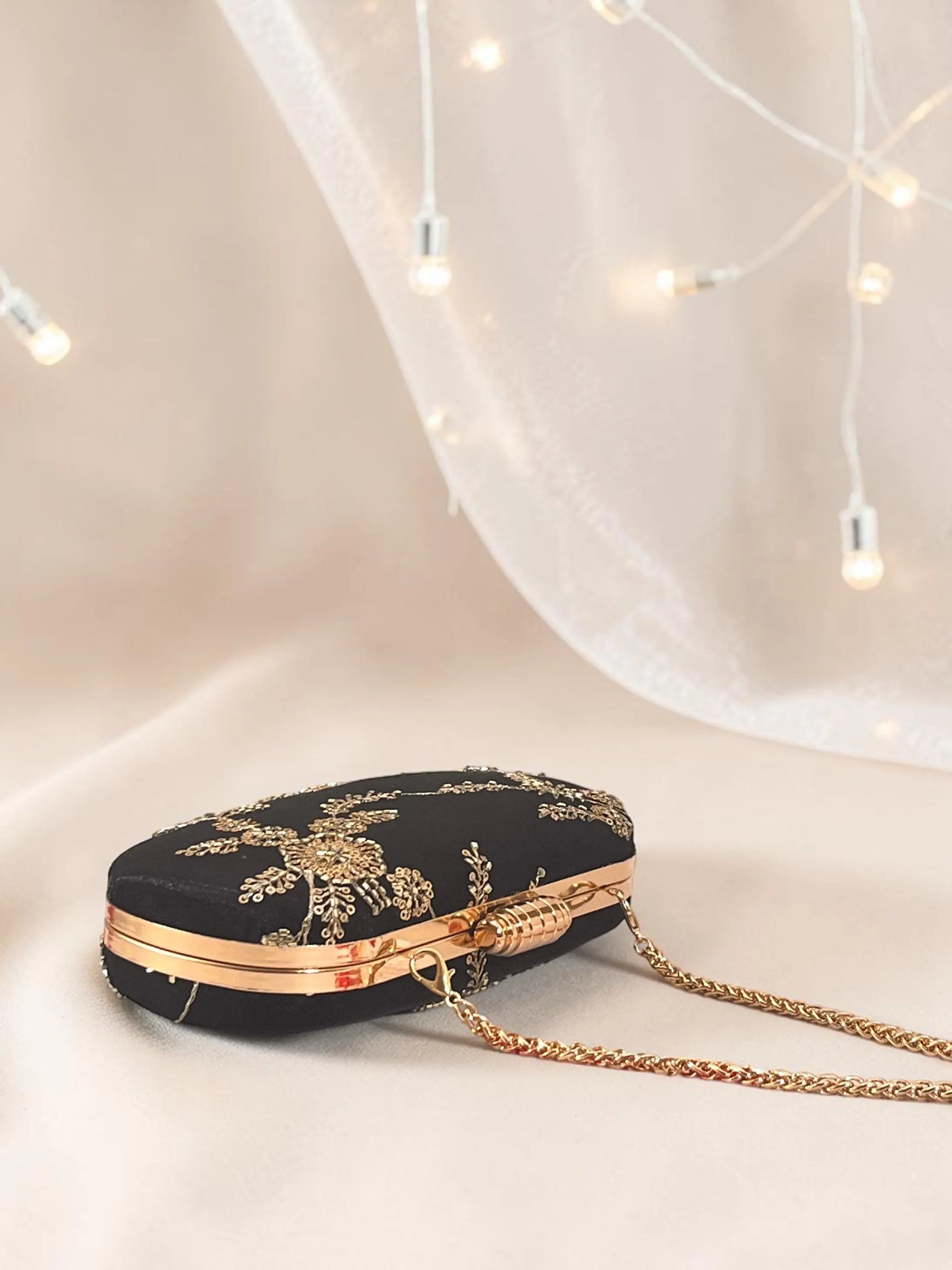 Noore Capsule Clutch - Black Gold YuvaStree