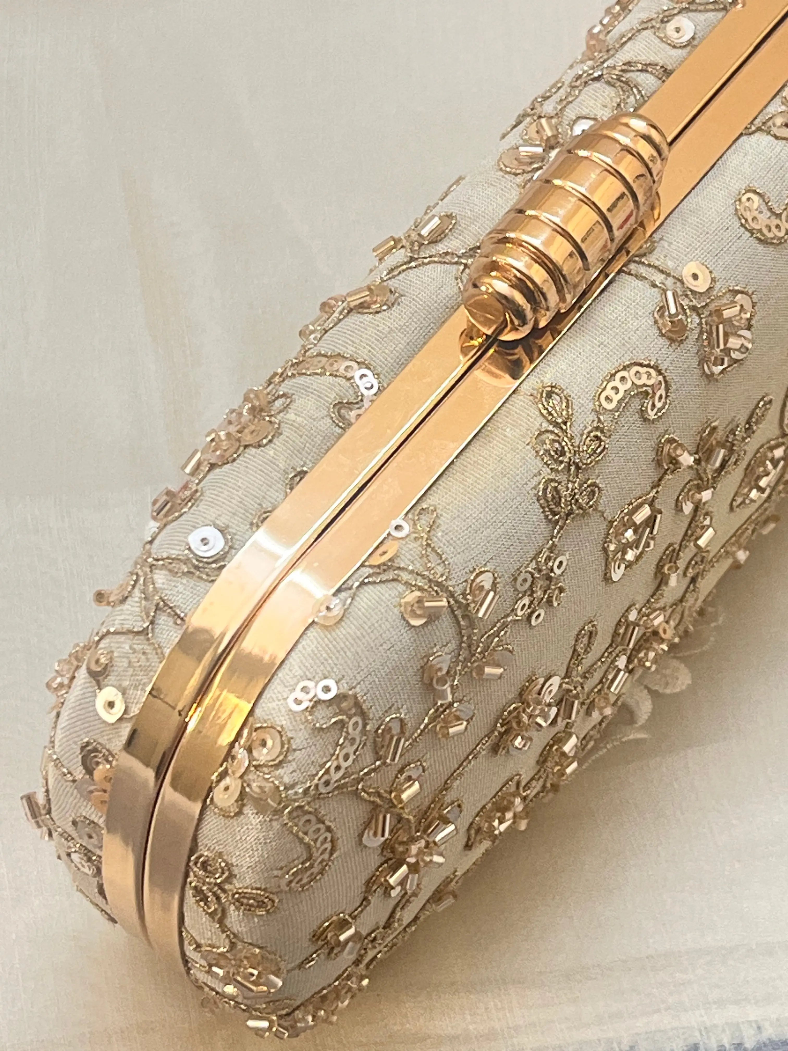 Noore Capsule Clutch - Gold YuvaStree