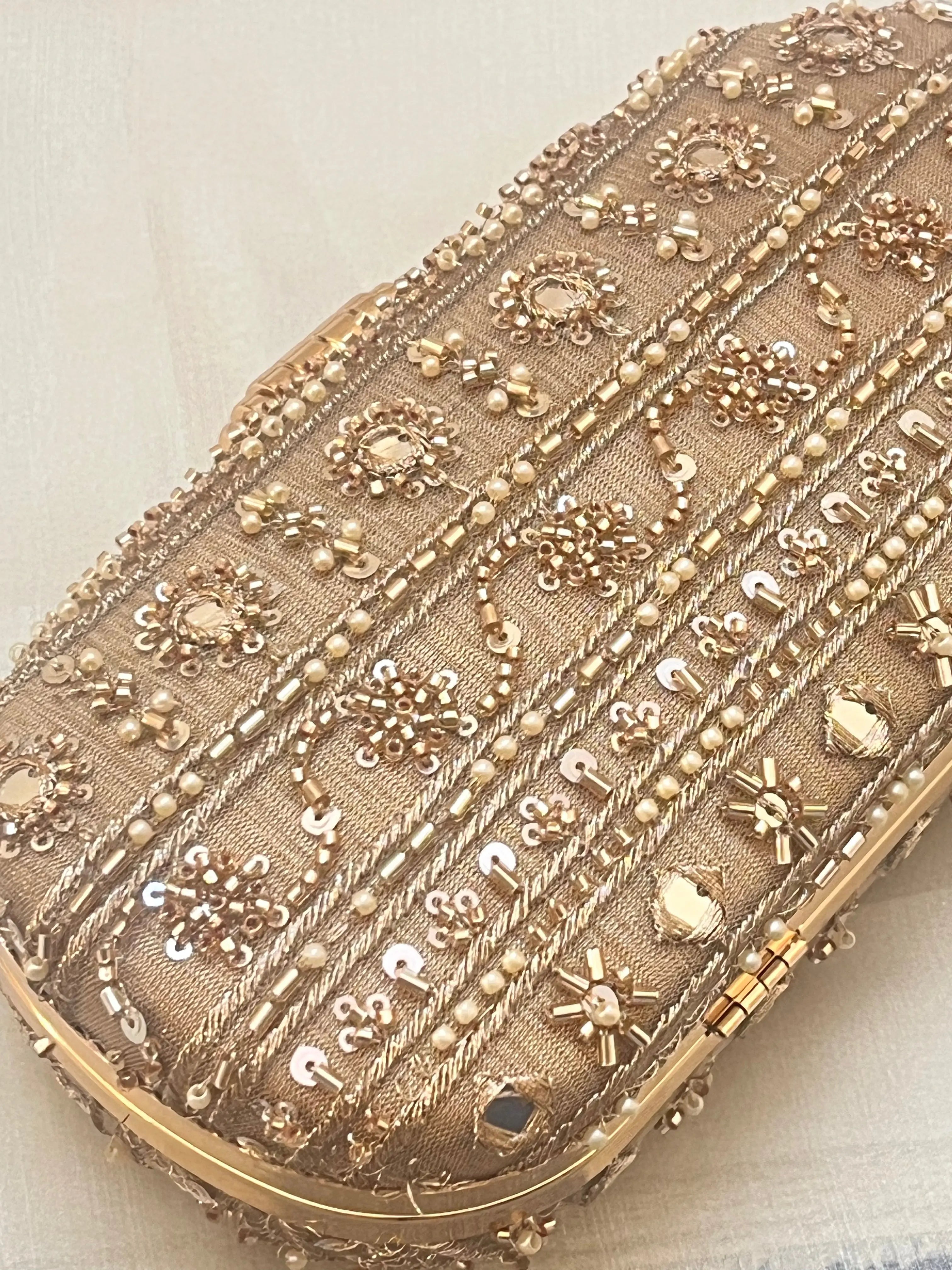 Noore Capsule Clutch YuvaStree